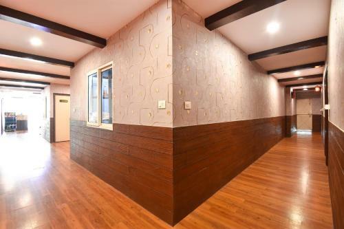 Fabhotel Dhanvitha Suites