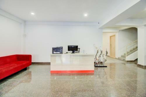 Capital O 77459 Smile Hotels