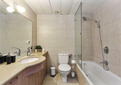 Apartamento The Green Garden Suite By The Beach