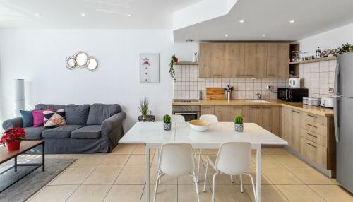 Apartamento The Green Garden Suite By The Beach