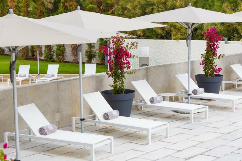 Ozadi Tavira Hotel