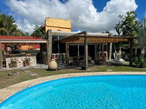 Adorable Pool House In A Beautiful Garden