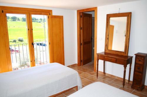 Casa Grande / Rosas Cantares