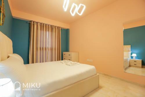 Miku Apartment - Vibrant 1bd Apartment At Olympic Residence