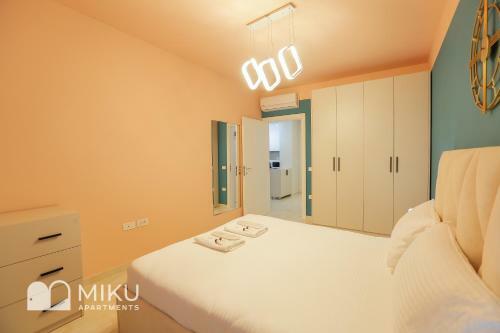 Miku Apartment - Vibrant 1bd Apartment At Olympic Residence