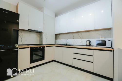 Miku Apartment - Vibrant 1bd Apartment At Olympic Residence