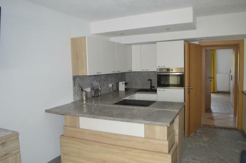 Apartamento Ferienwohnungen Restaurant Pizzeria Langreiter
