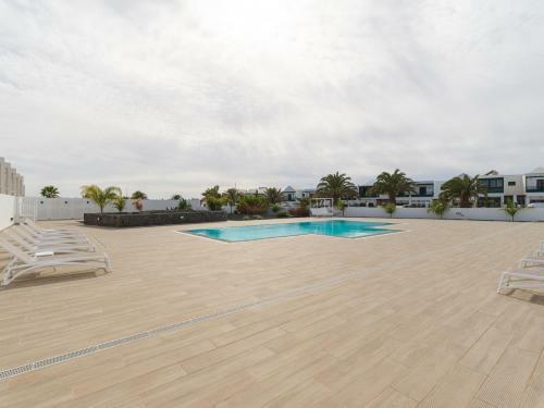 Moderno Apartamento Con Piscina En Costa Teguise