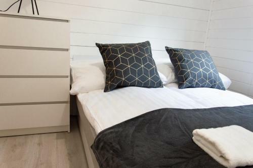 Domki Bia?a Per?a