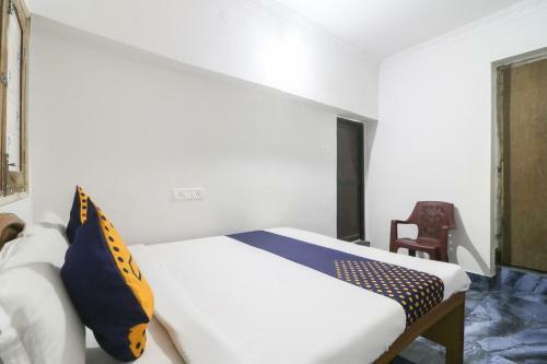 Spot On 61644 Hotel Kumar Kripa