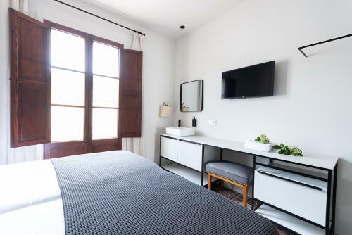 Hotel Unic - Turisme D'interior