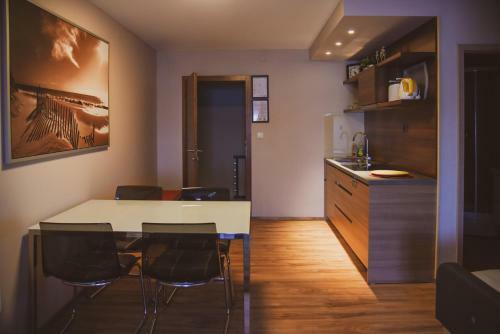 Apartmani Kameno Sidro