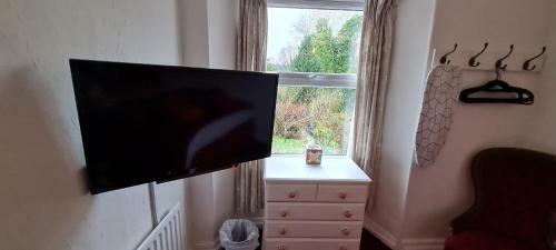 Hostal Holly Cottages