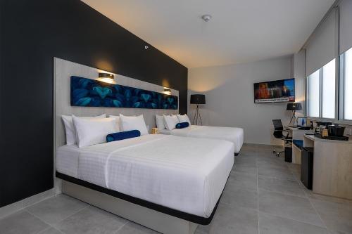 River Garden Hotel + Suites