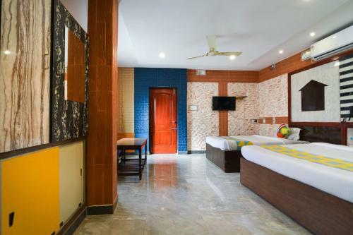 Hostal Vaccinated Staff - Oyo Home 78224 Gnanam Residency