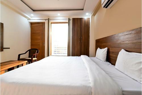 Fabhotel Holy House