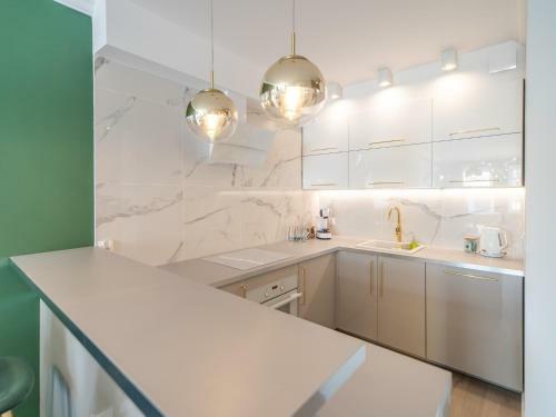 Apartamenty B??kit Na Fali - Miodowy Dom