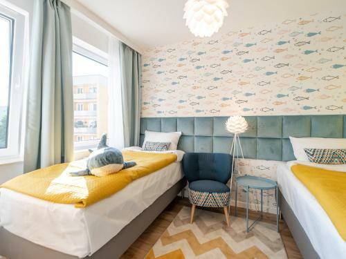 Apartamenty B??kit Na Fali - Miodowy Dom