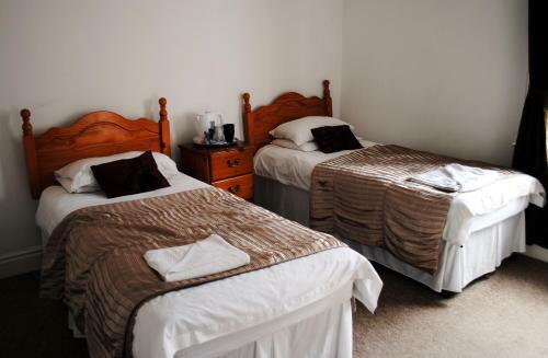 Hostal The Queens Head Hotel