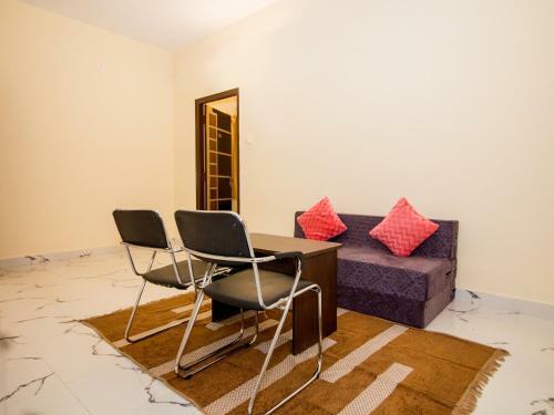 Fabhotel Pearl Suites