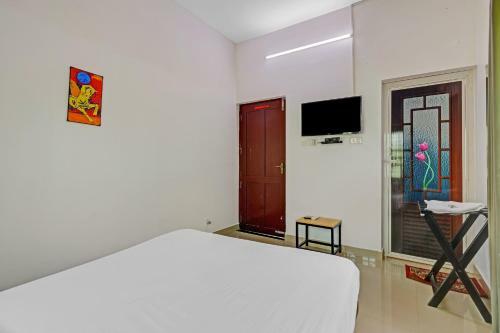 Hotel Capital O 84184 Pop Tavern Kazhakkottam