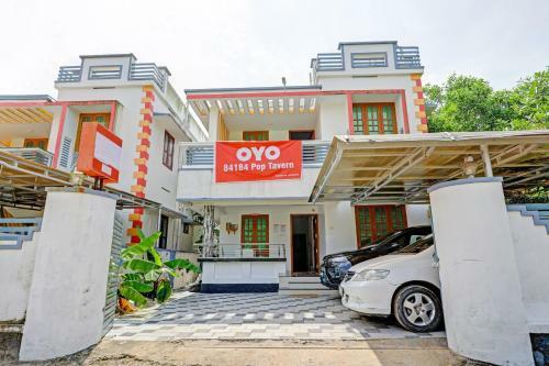 Hotel Capital O 84184 Pop Tavern Kazhakkottam