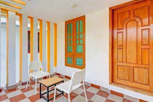 Hotel Capital O 84184 Pop Tavern Kazhakkottam