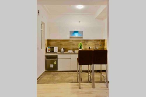 Apartamento The Groovy Square Near India Expo Mart