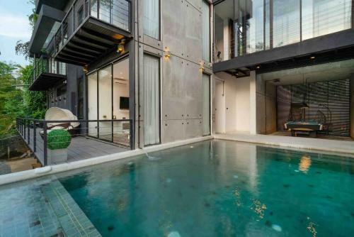 Ultramodern Riverfront Villa With Infinity Pool