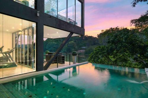 Ultramodern Riverfront Villa With Infinity Pool