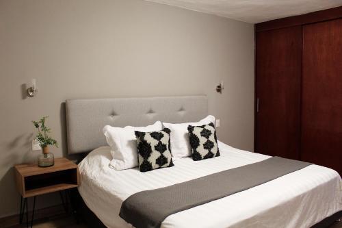 Hostal Suites Ciento 37