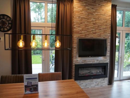 Spacious Chalet With Decorative Fireplace, Located On The Veluwe