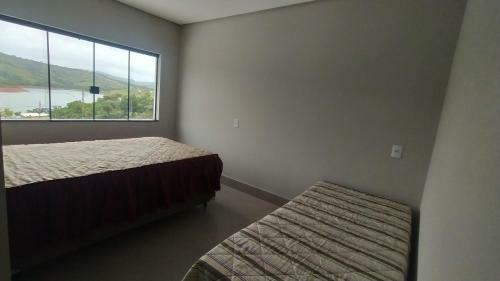 Casa Em Capit�lio Com 5 Su�tes