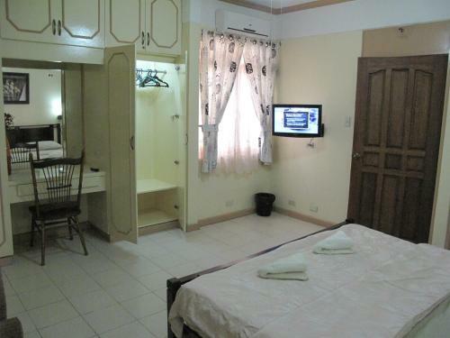 Apartamento Makati Suites At Travelers Inn