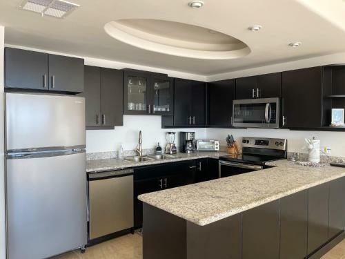 Apartamento Stylish Luxe Condo With Ocean View And Pools