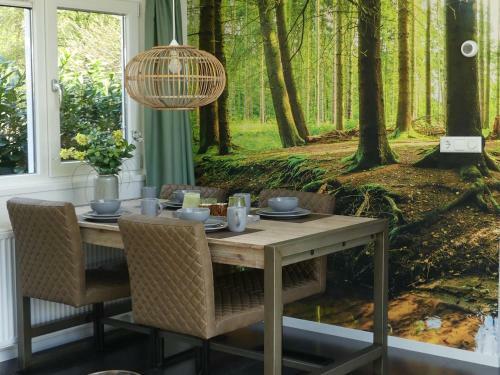 Modern Chalet With Outdoor Fireplace At The Forest