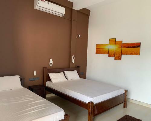 Hotel Tandoori Hut Inn Arugambay