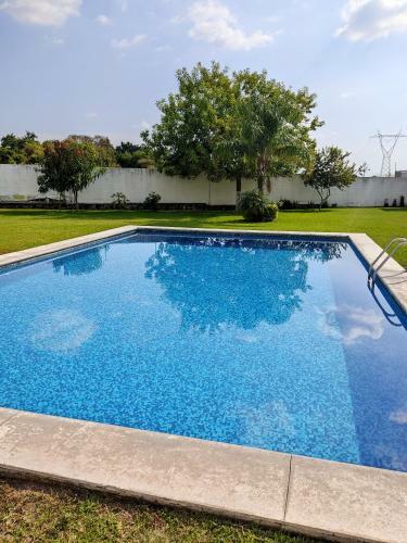 Bed & Breakfast Casa Roja, Puerta Trasera, Jard�n Y Alberca