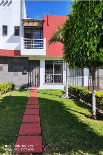 Bed & Breakfast Casa Roja, Puerta Trasera, Jard�n Y Alberca