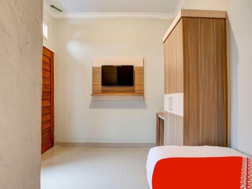 Hotel Vaccinated Staff - Oyo 90174 Ebarly Syariah