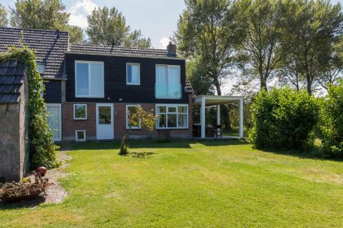 Lepelstraat 14, Vrouwenpolder- Knotwilg
