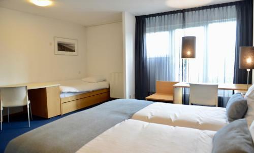 Apartamento Strandappartementen de Gulden Stroom