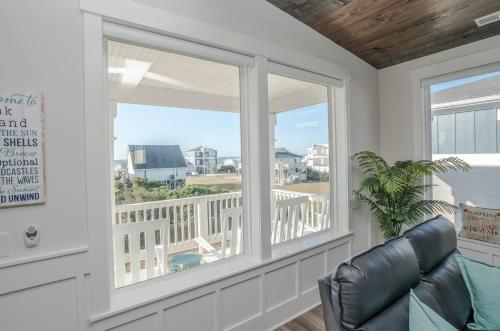 Enjoy The Coastal Breeze In This Pet Friendly Home