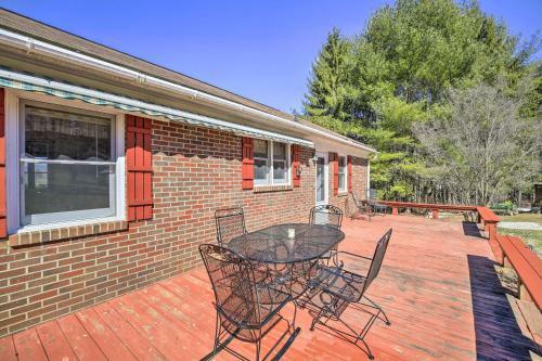 Quaint Creekside Home With Spacious Deck And Yard