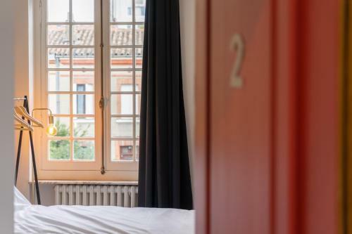 Hotel H�tel Une Chambre En Ville