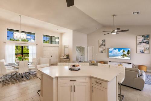 Waterfront Home With Golf Access & Heated Pool