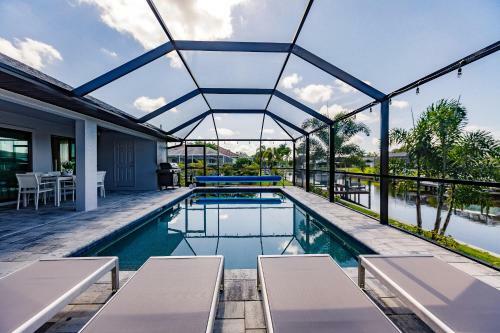 Waterfront Home With Golf Access & Heated Pool