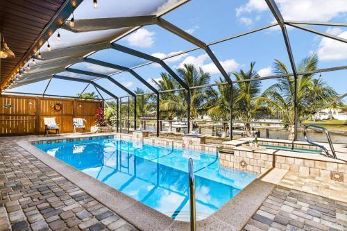 Direct Access Waterfront Villa With Heated Pool & Spa Edgewater Escape Roelens Vacations