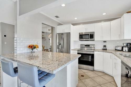 Palm Breeze Waterfront Delight