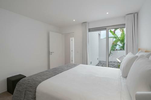 Casas Da Vargem Shared Swimming Pool By An Island Apart